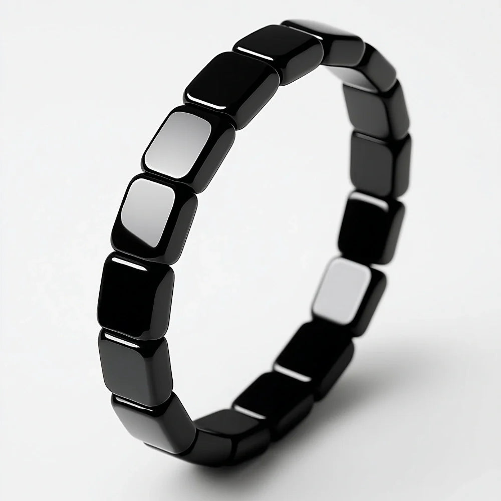 Detalle de pulsera de hematita negra masculina Hora Paris